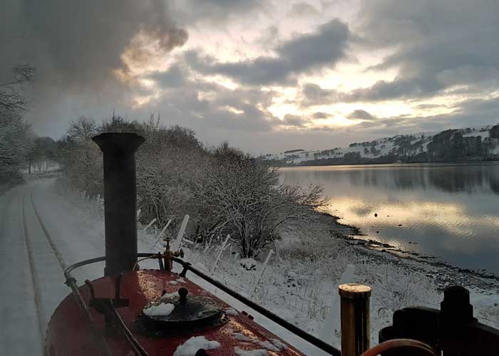 Alice in the snow alongside Llyn Tegin/Bala Lake