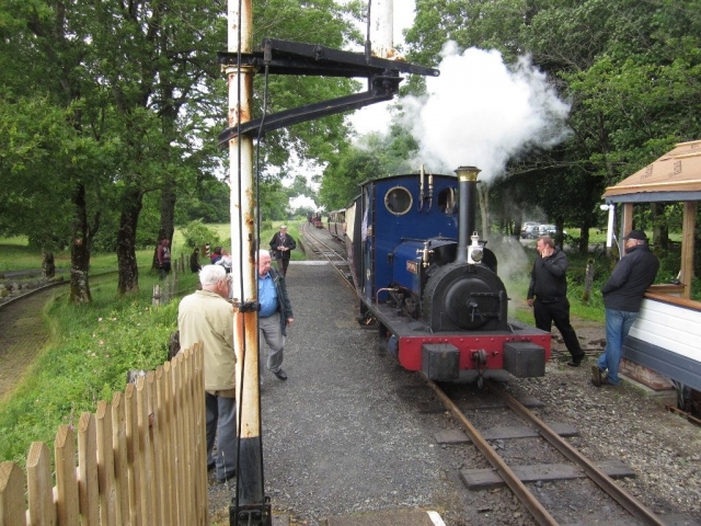 Holy War departs from the Llangower loop, a freight can be seen in the background