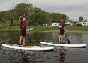 Racing the Train on a paddleboard 